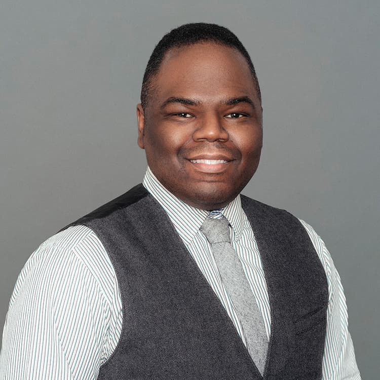 Headshot of Greg Desrouleaux