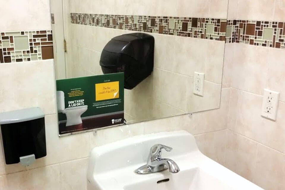 OOH advertising with mirror clings at bars or restaurants