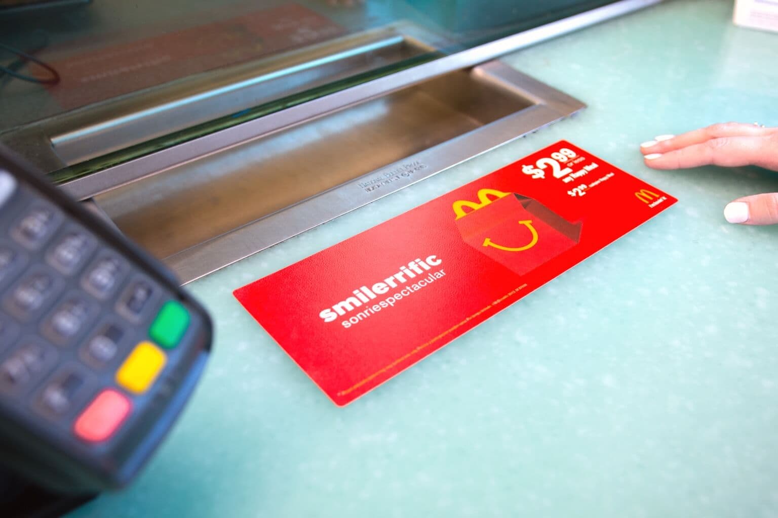 OOH advertising with counter mats at financial service centers