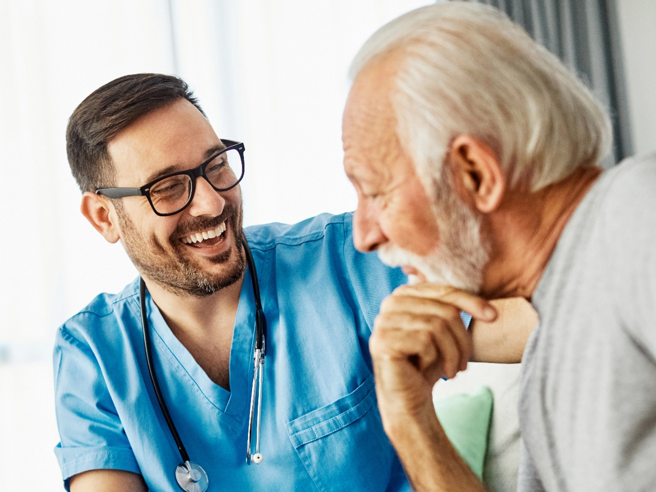 Doctor in conversation with patient.
